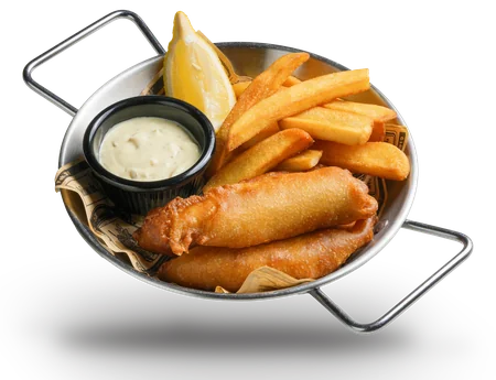 Battered fish and thick-cut chips in a steel pan with tartare sauce and a lemon wedge
