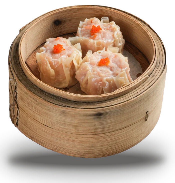 Steamed siu mai topped with tobiko in a bamboo steamer basket