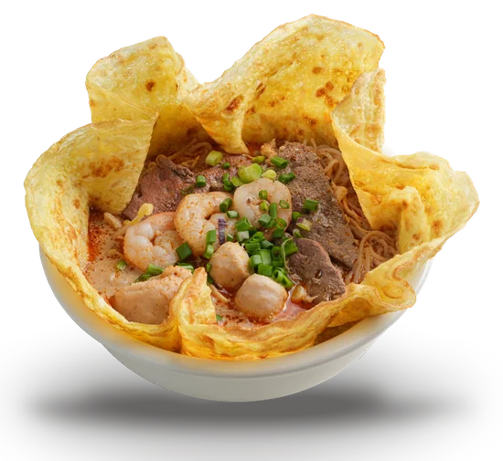 Spicy noodle soup with prawns, fish balls, sliced beef and spring onion in a crisp fried wrapper basket